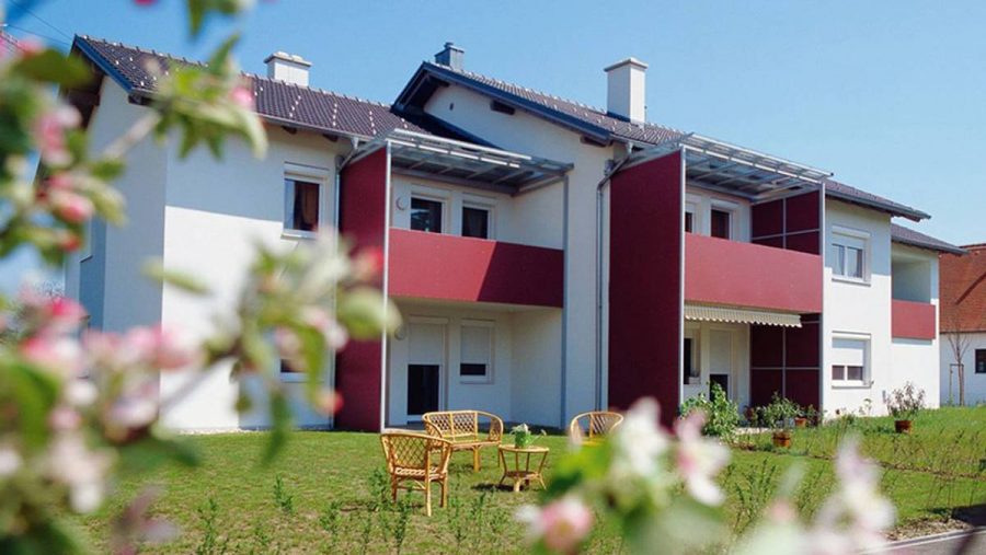 Modernes Mehrfamilienhaus mit Garten in ruhiger Lage, ideal für Wohnung kaufen in Wien.