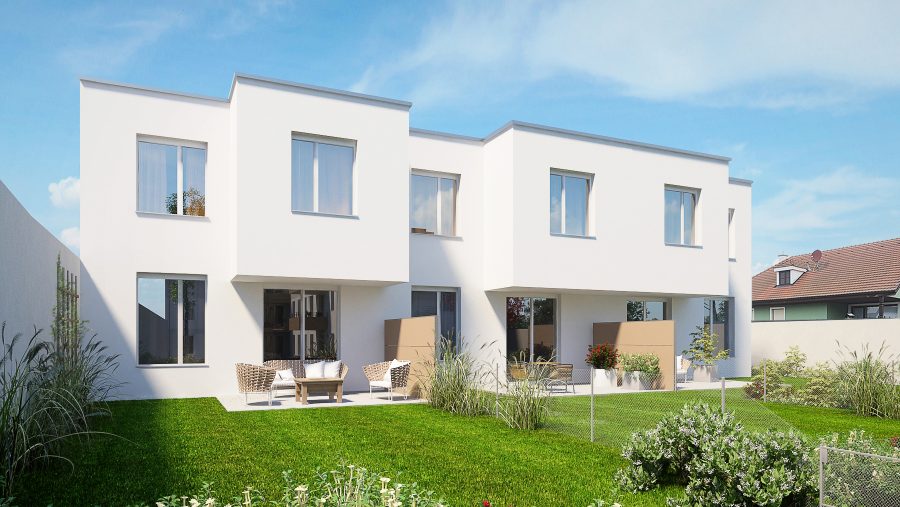 Moderne Doppelhaushälfte mit Garten und Terrasse an einem sonnigen Tag.