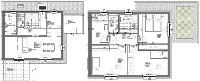 Grundriss eines Hauses mit verschiedenen Räumen wie Küche, Wohnzimmer und Schlafzimmer in Draufsicht.