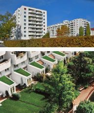 Referenz Engerthstraße Mehrgeschossige Wohngebäude mit Grünflächen und Bäumen bei sonnigem Wetter, moderne städtische Architektur.