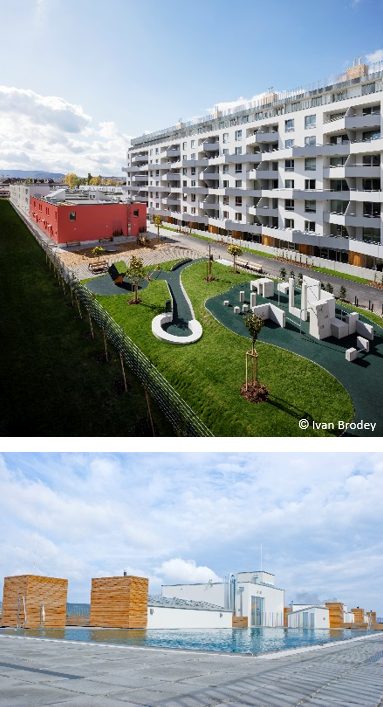Referenz Lastenstraße Moderne Wohnanlage mit Garten und Dachterrasse unter blauem Himmel.