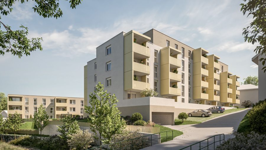 Moderne Wohngebäude mit Balkonen, grüne Umgebung, ideale Lage für Wohnungskauf in Wien.