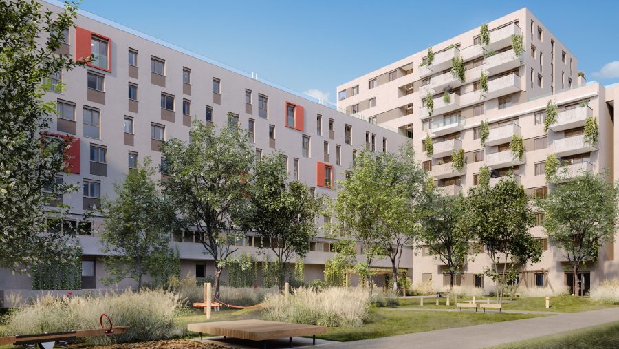 Mehrstöckige Wohngebäude mit Balkonen und Gartenanlagen bei sonnigem Wetter.